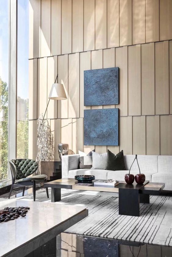 Double-height grand lobby with marble flooring